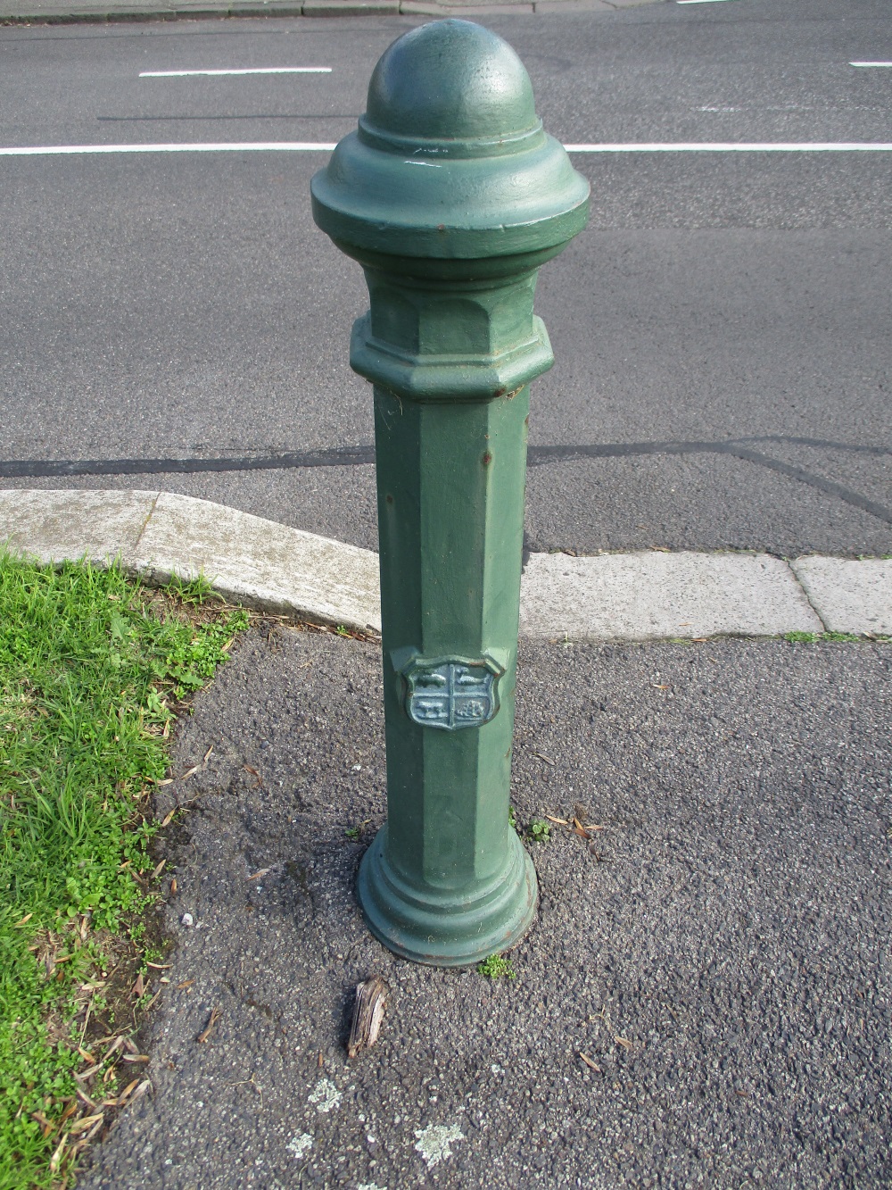 Melbourne City Council coat of arms on bollard in Canning Street North Carlton