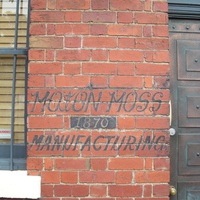 Signage for Moton Moss Manufacturing at the Cotton Mill
