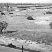 A view looking north-east over part of the golf course, across the docks towards Melbourne