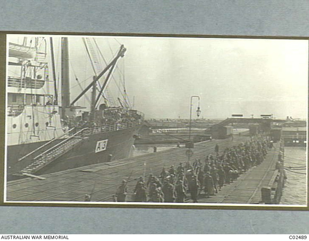 'Troops march onto the Pier'