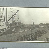 'Troops march onto the Pier'