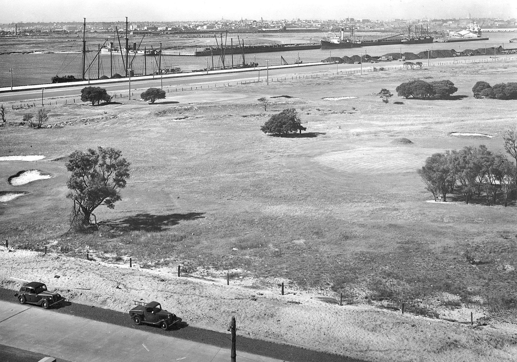 A view looking north-east over part of the golf course, across the docks towards Melbourne